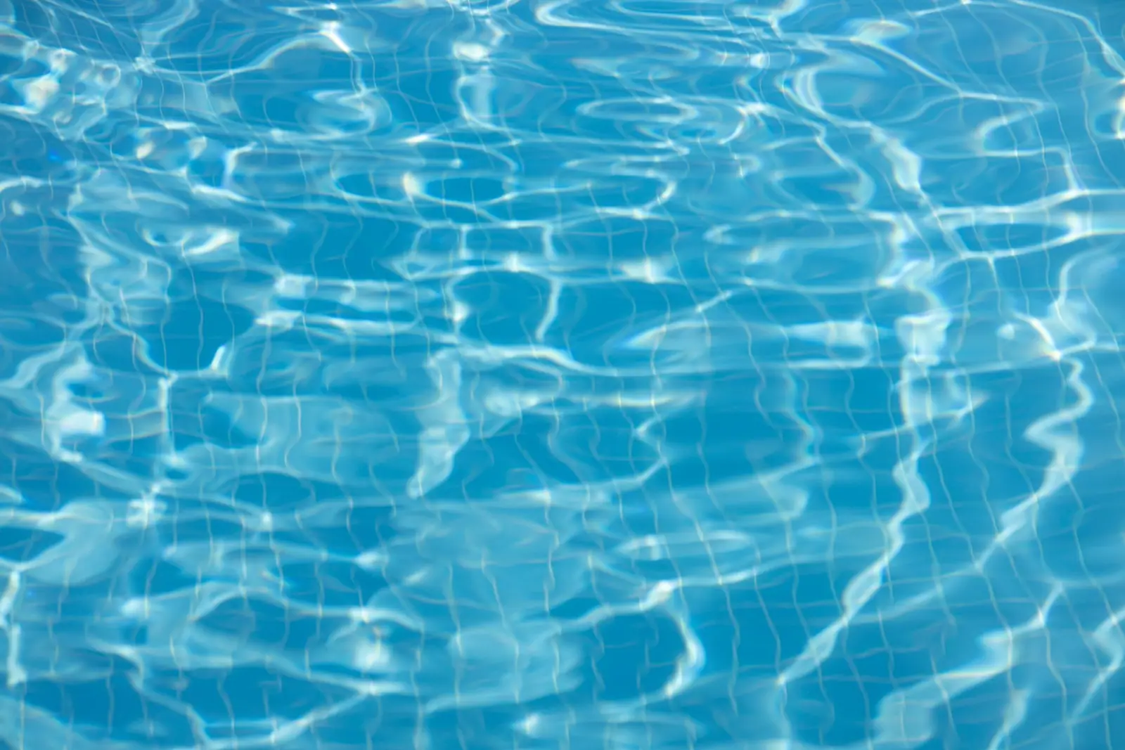A close view of clear rippled pool water